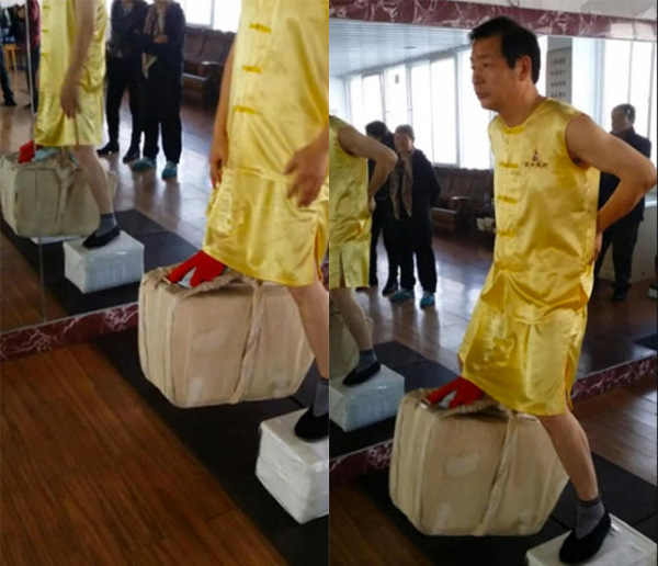 Китаец поднял 80-килограммовый груз собственными яичками
