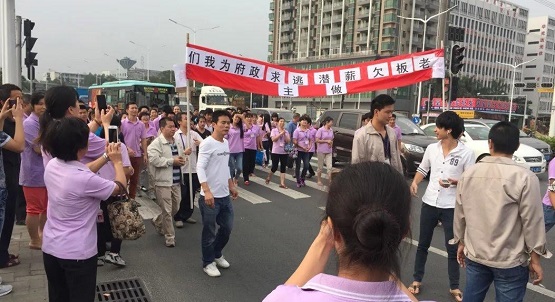 протесты рабочих в китае, рабочие протесты в китае. забастовки в китае