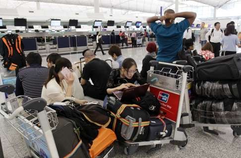 аэропорт Гонконга задержки рейсов