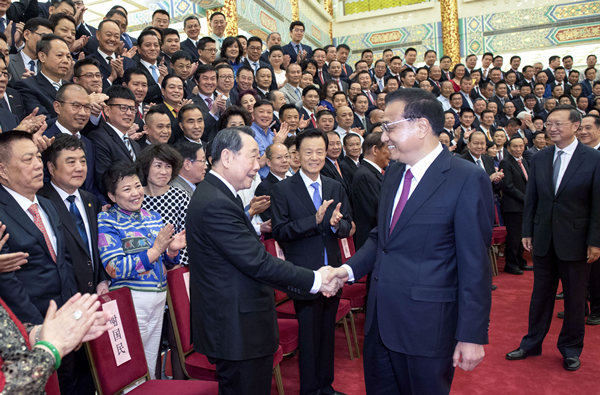 Премьер КНР Ли Кэцян на встрече с представителями хуацяо в Пекине