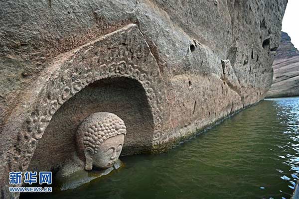 Статуя Будды, обнаруженная в водохранилище Хунмэнь в декабре прошлого года. Фото: China Daily
