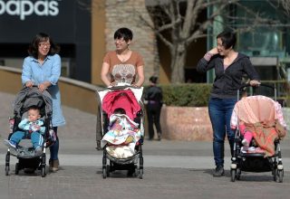 Chinese-mothers-pushing-strollers-carrying-their-newborn-babies-Beijing-Oriental-Image-via-Reuters.jpg