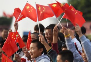 china-national-day-people-wave-national-flag-tiananmen-square-memorial-service-nations.jpg