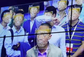 visitors-experience-facial-recognition-technology-at-face-booth-during-the-china-public-security-expo-in-shenzhen-810x456-e1523207746883.jpg